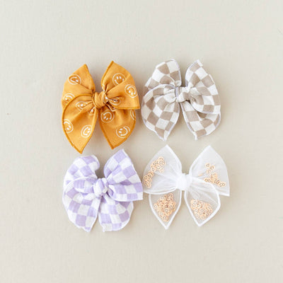 Smiley | Petite Party Bow: Alligator Clip